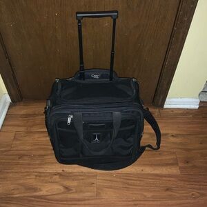 Travelpro Crew 4 Rolling briefcase. In good condition.missing rear handle.